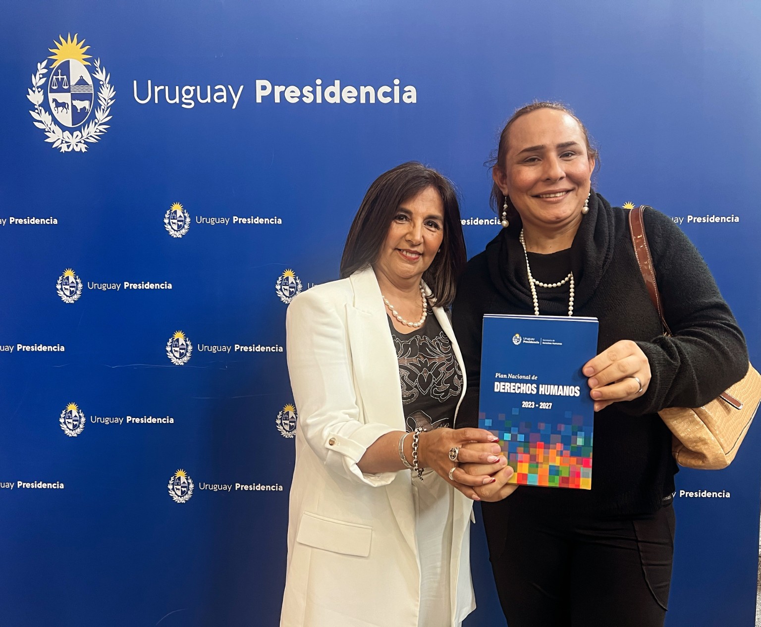 Marisol Díaz de Cordova en una actividad de Presidencia de la República con el Plan Nacional de Derechos Humanos
